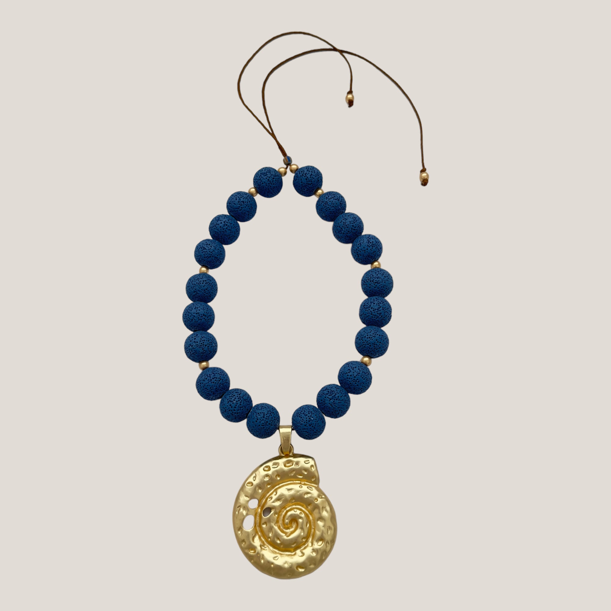 Maxi bracelet with golden turtle and colored lava