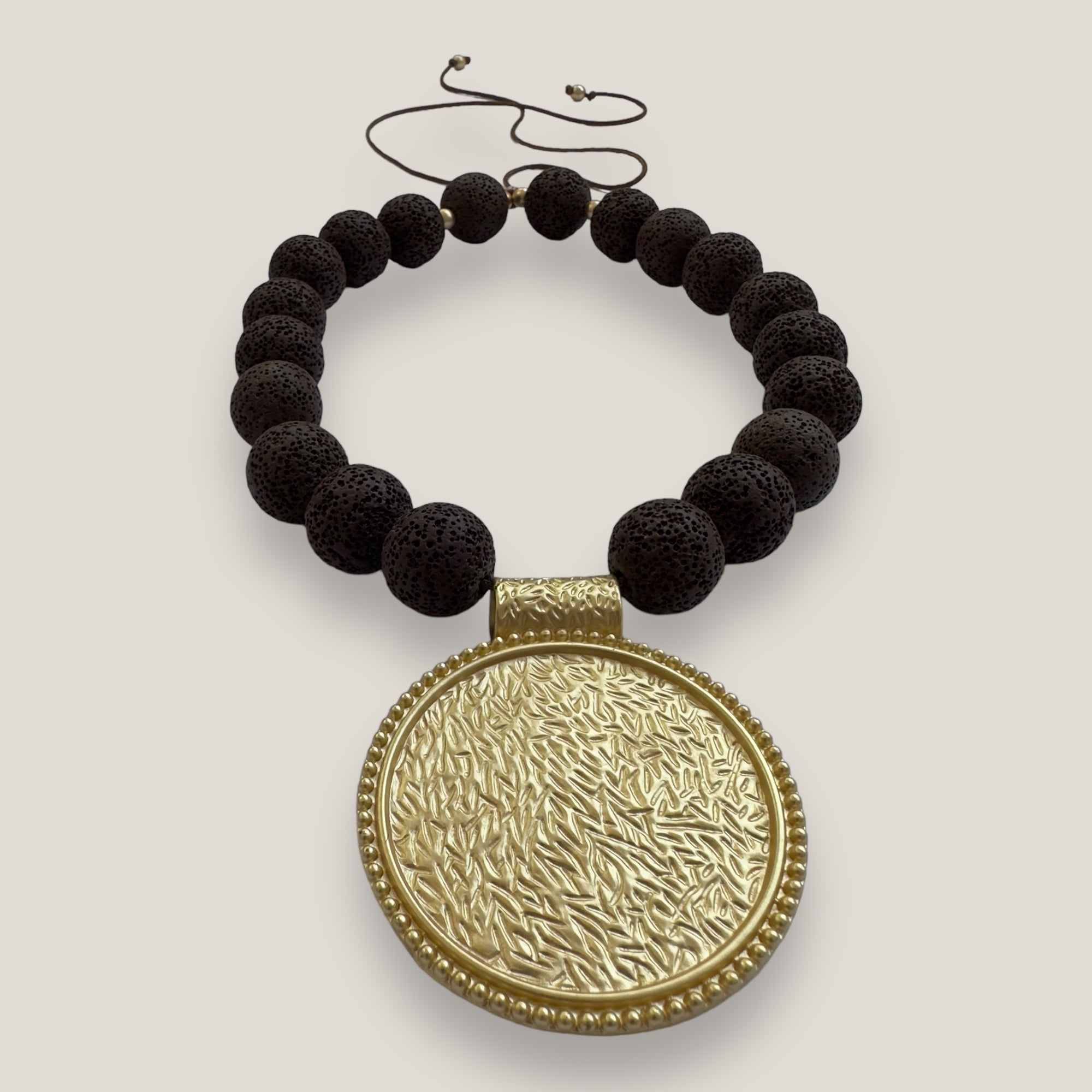 Maxi bracelet with golden turtle and colored lava