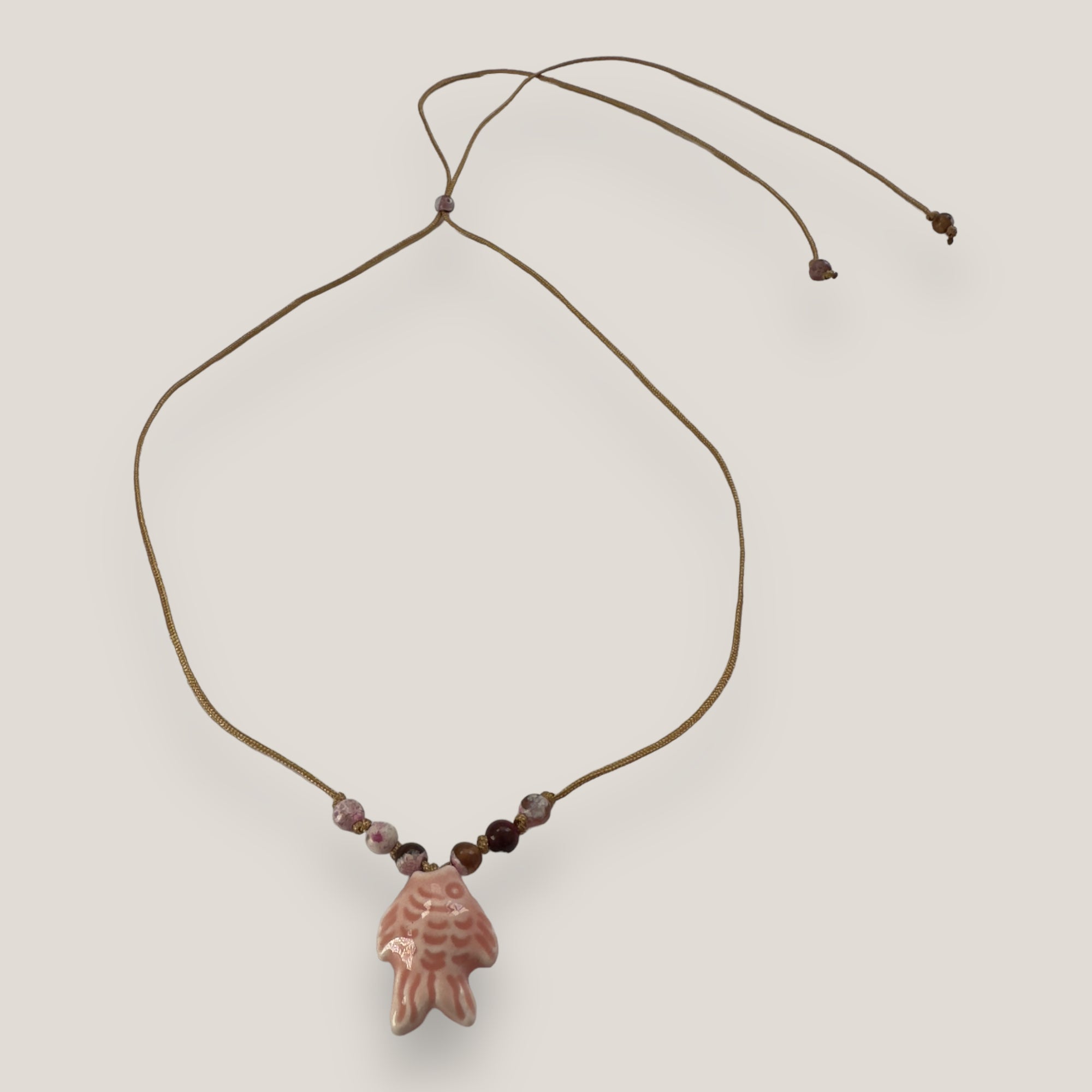 Bracelet with large golden turtle and colored lava