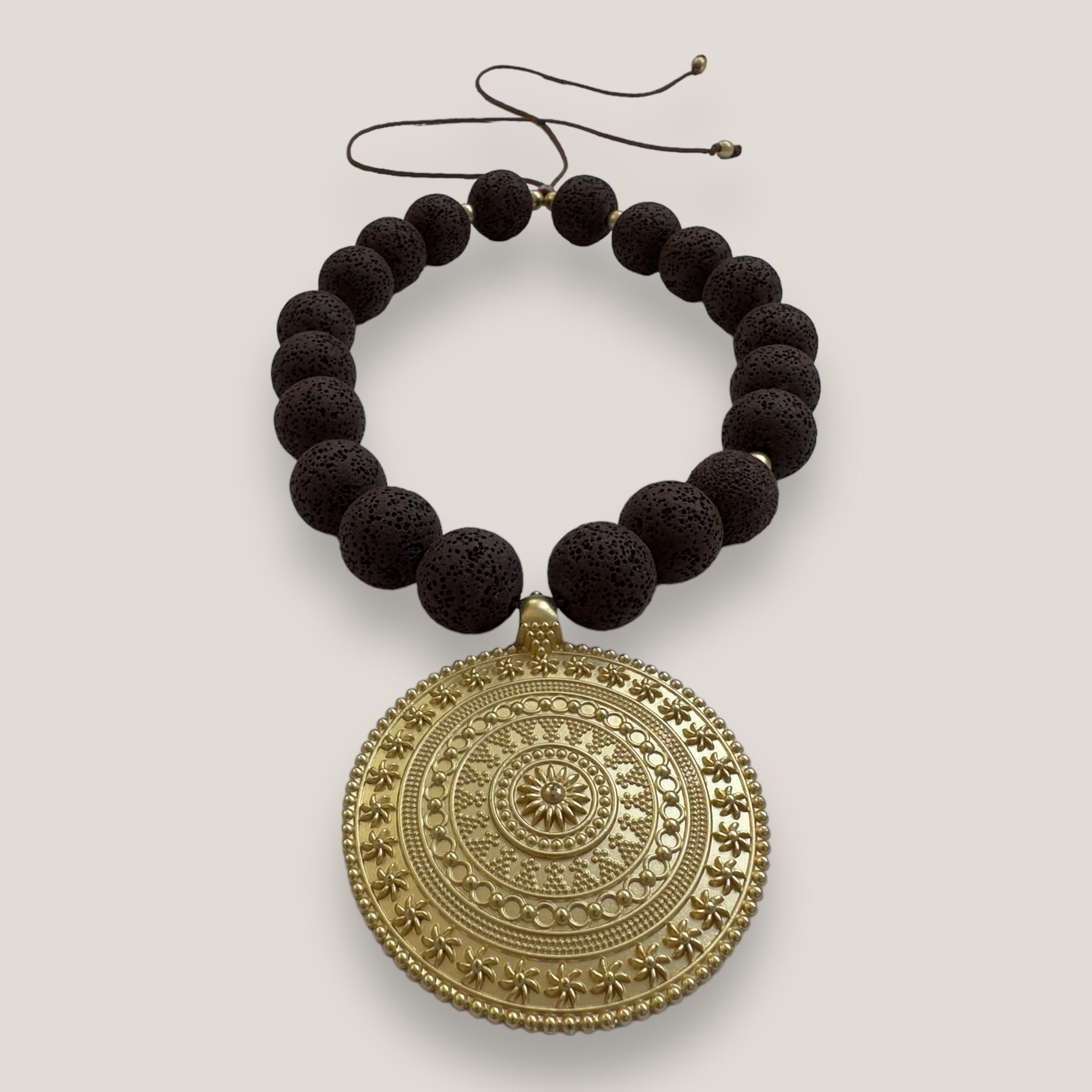 Maxi bracelet with golden turtle and colored lava