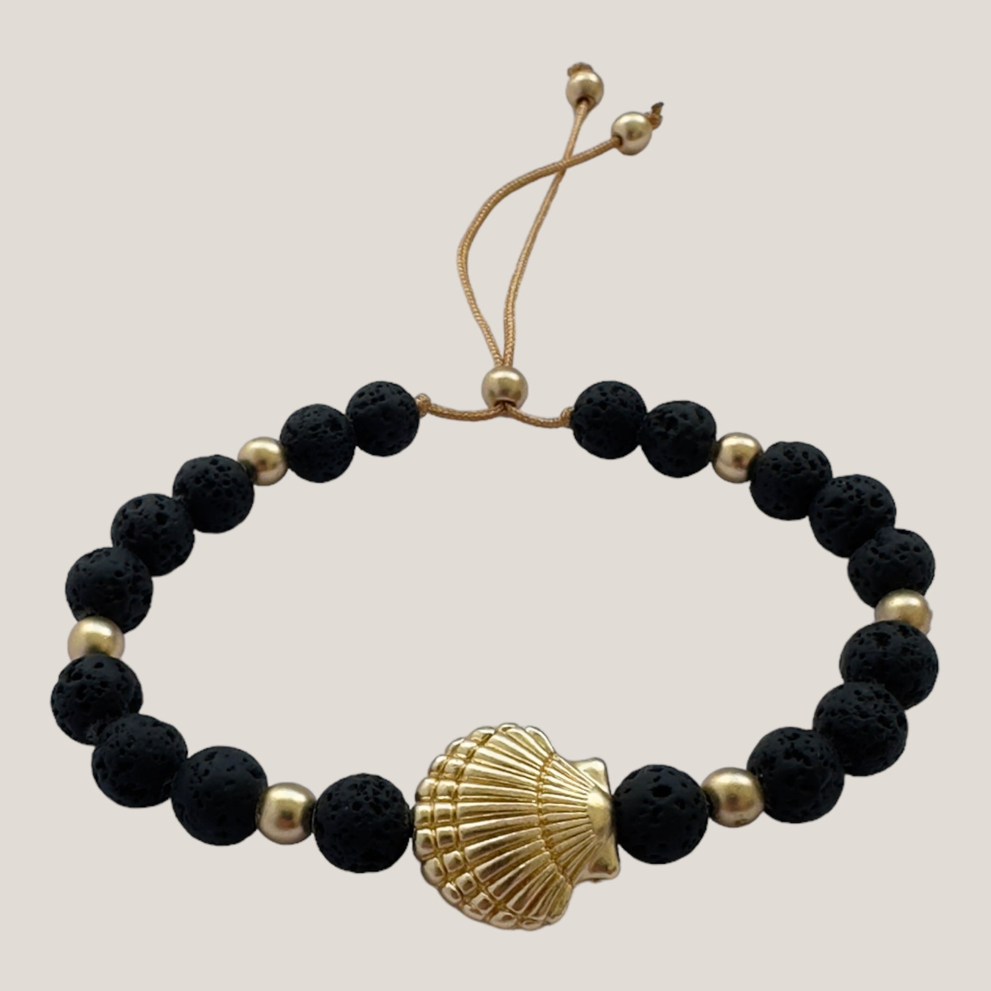 Bracelet with large golden turtle and colored lava