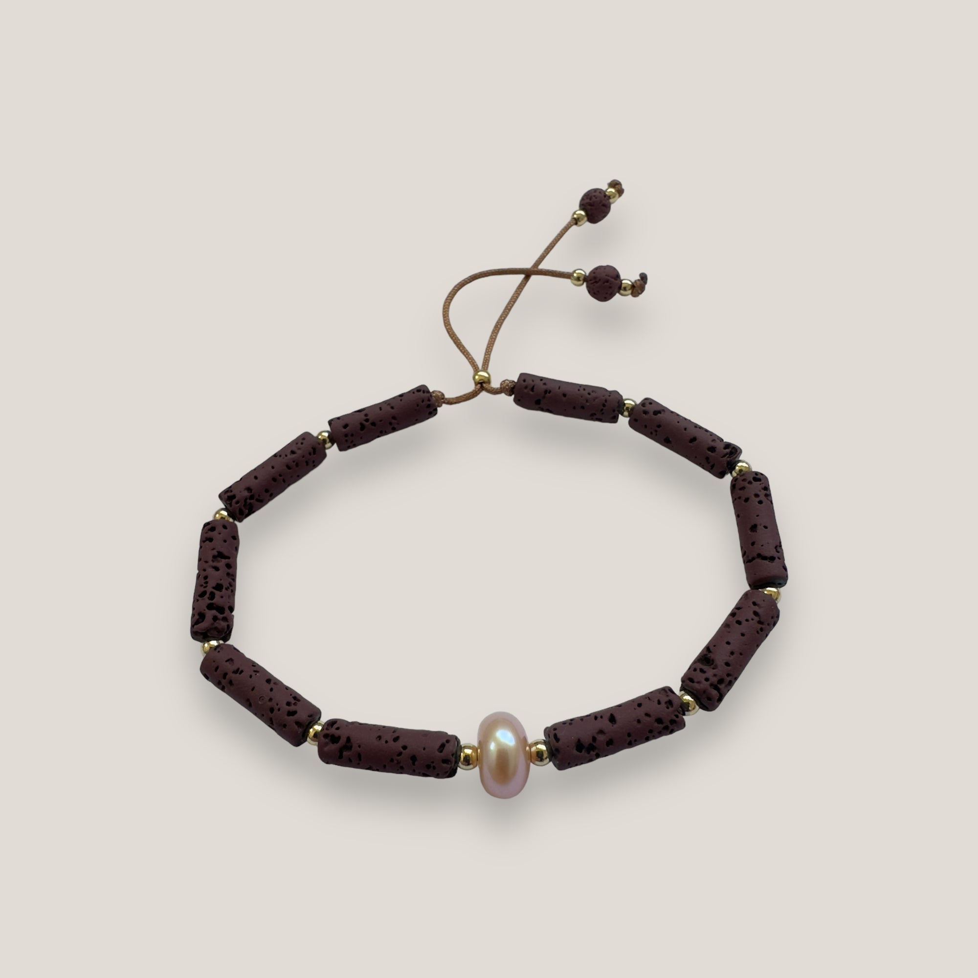 Bracelet with large golden turtle and colored lava