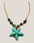 Bracelet with large golden turtle and colored lava