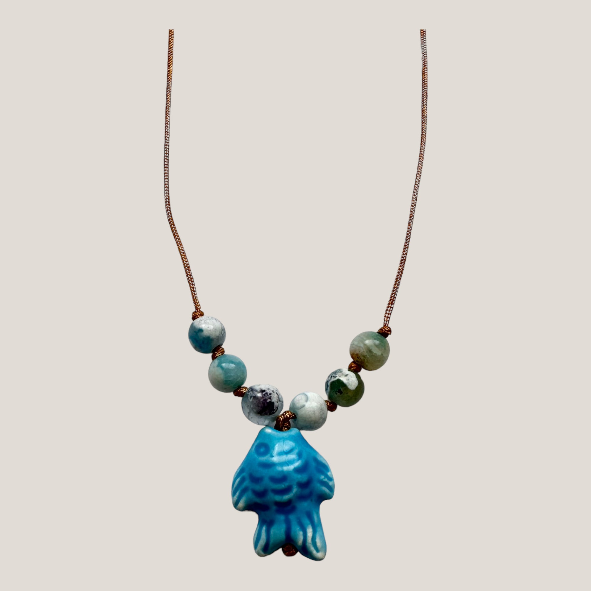 Bracelet with large golden turtle and colored lava