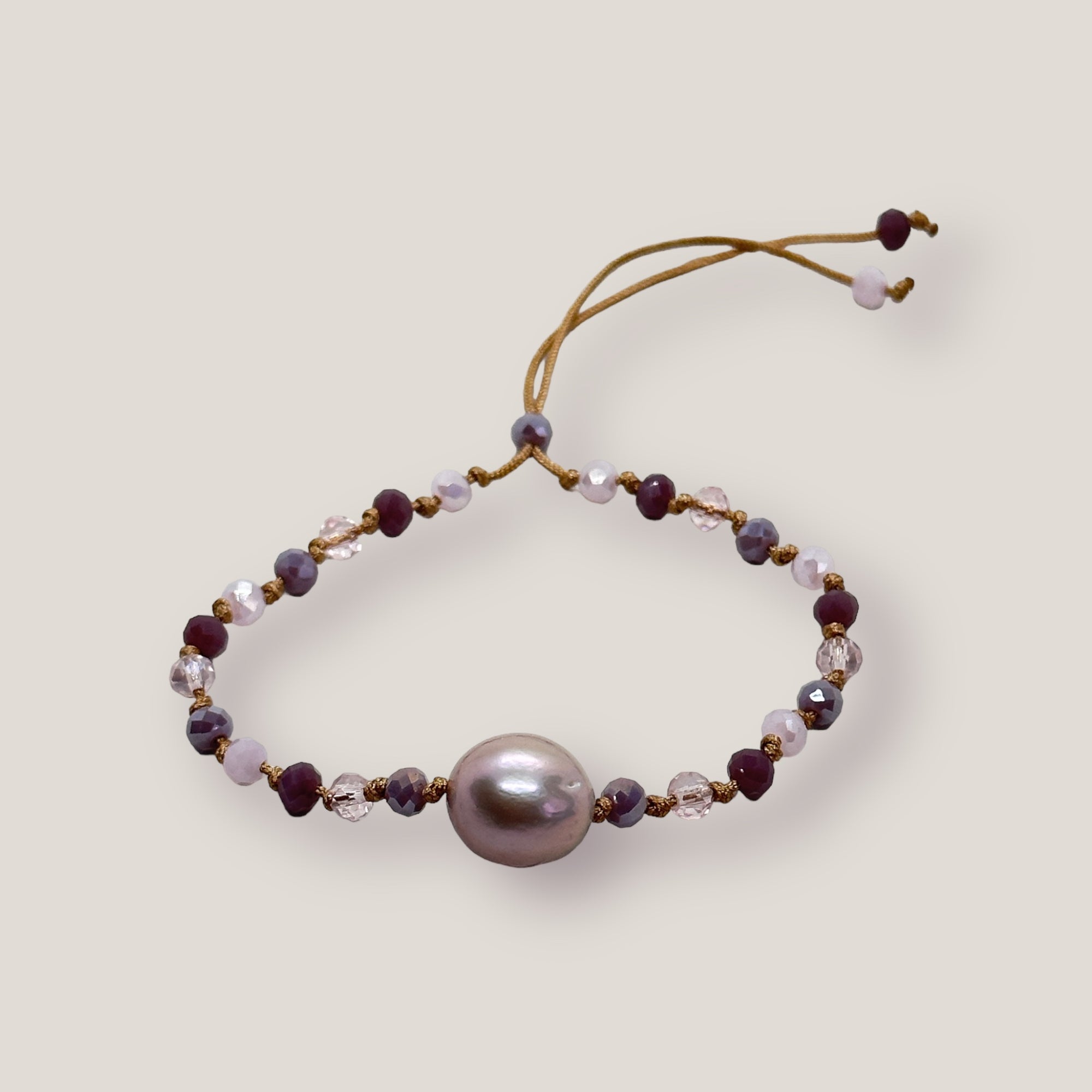 Bracelet with silver turtle and purple lava