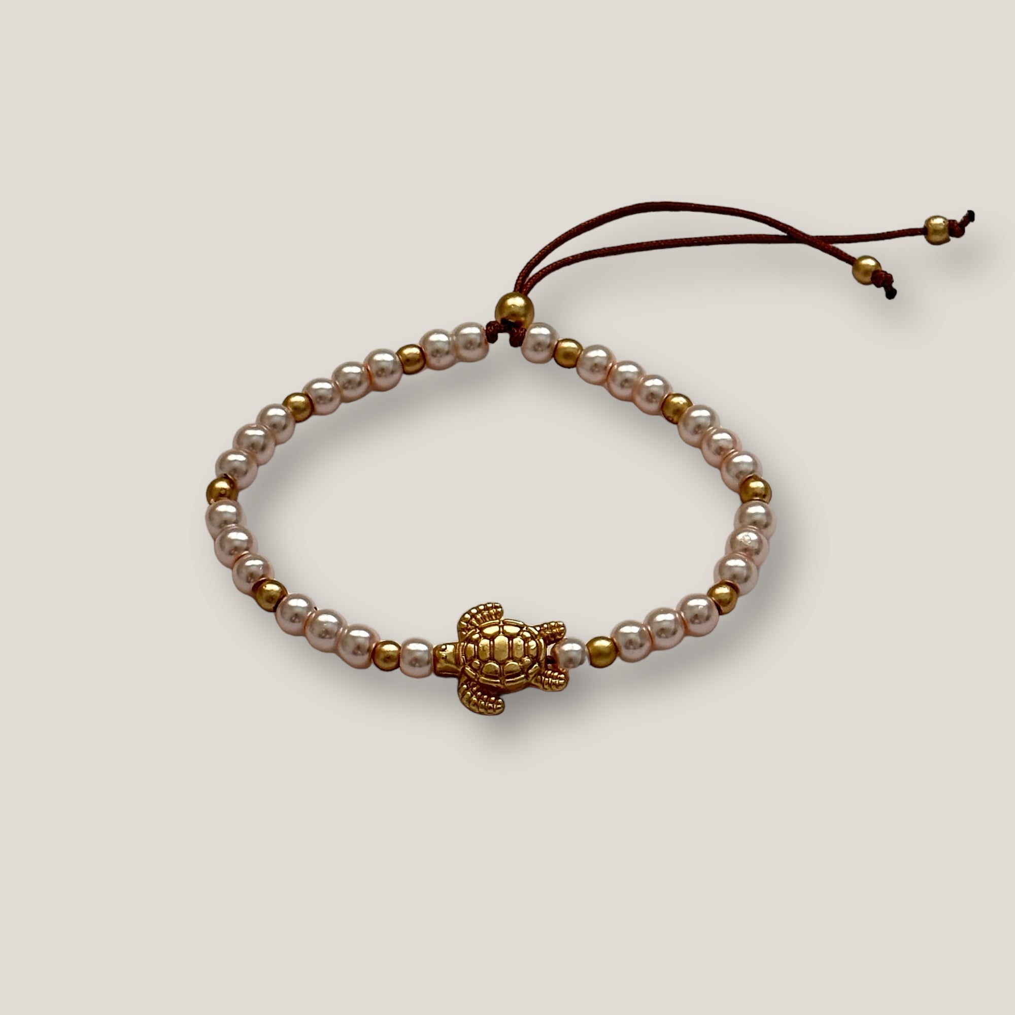 Golden turtle bracelet and colored lava