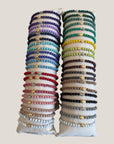 Pulsera con tortuguita plateada y lava blanca
