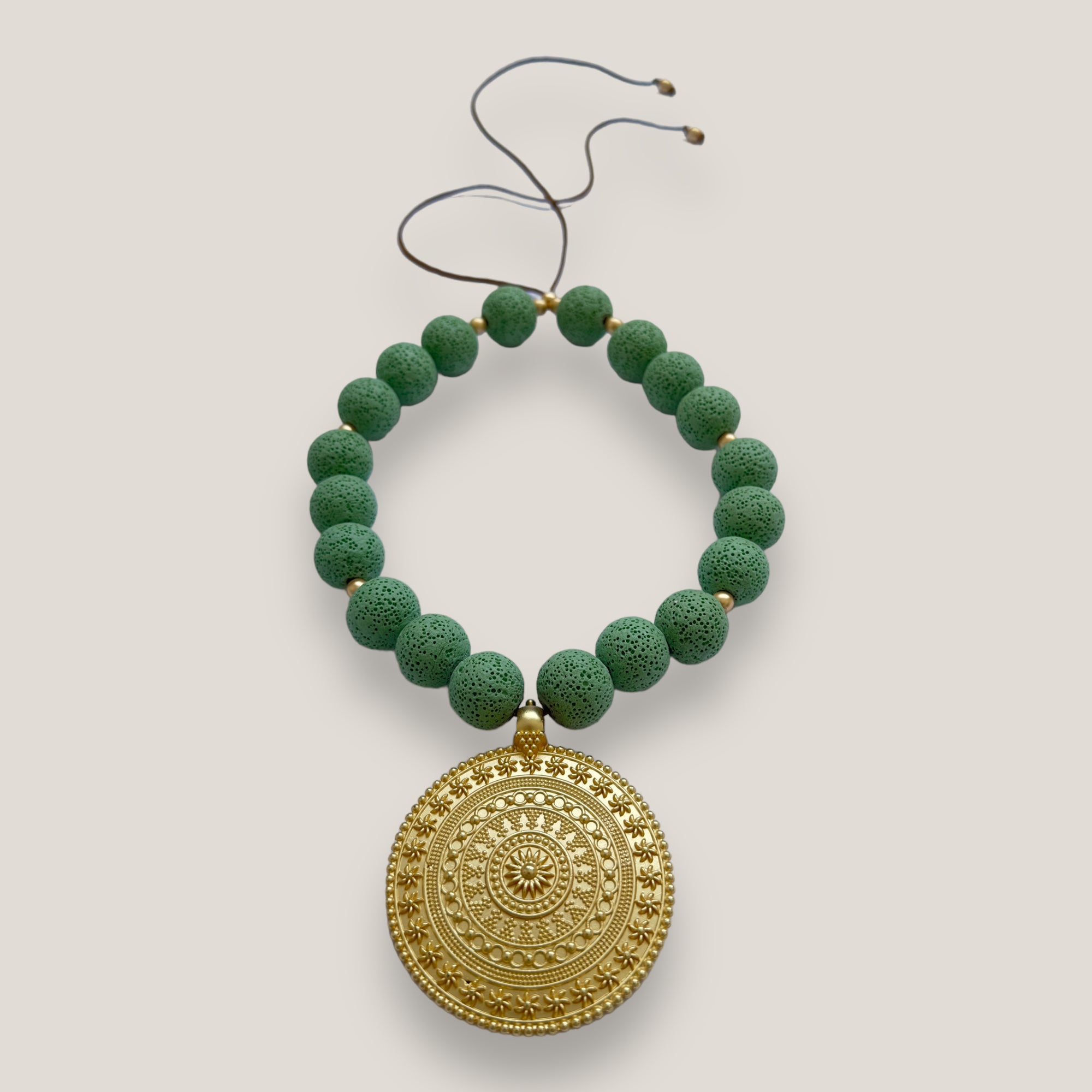 Maxi bracelet with golden turtle and colored lava