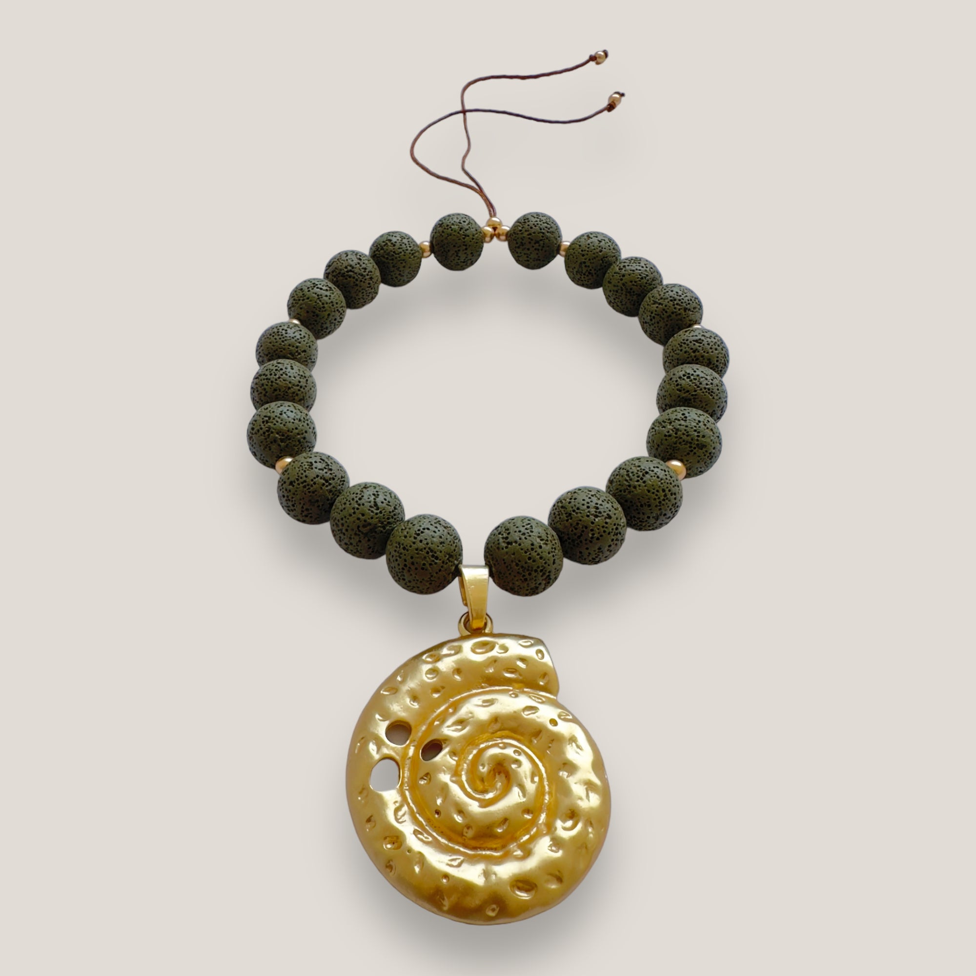 Maxi bracelet with golden turtle and colored lava