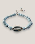 Pulsera gran cowrie plateado y lava blanca