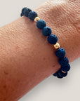 Pulsera Tirma piedra dorada y lava azul añil