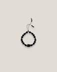 Pulsera tortuga resina negra lava negra cristales facetados negros