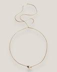 Collar minimal con bola de esponja coral beis y separadores dorados con brillis de cristal blanco