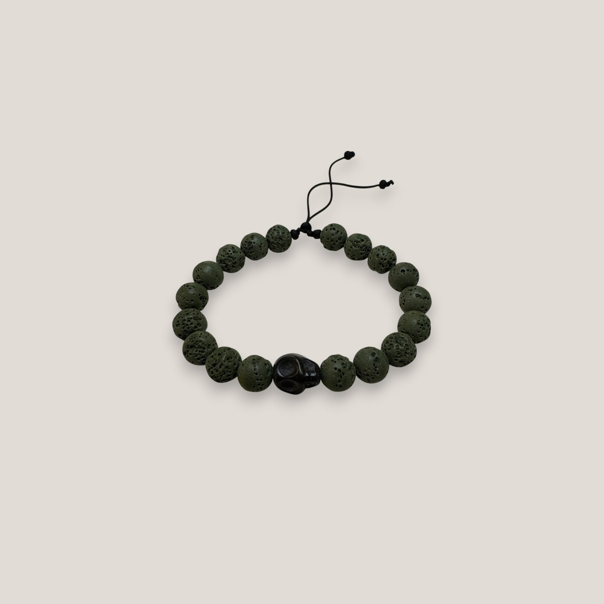 Pulsera con gran calavera howila negra esponja coral verde caqui