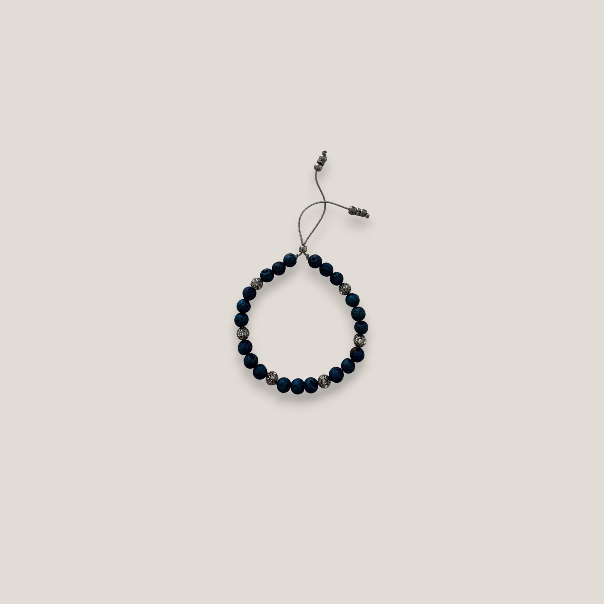 Pulsera Dafne 6mm lava azul añil y filigrana gunmetal con cristalitos