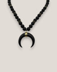 Collar luna cuerno lava negra separadores dorados cristal negro