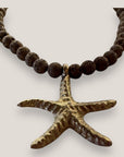 Collar estrella de bronce con cuentas de lava metalizadas en bronce