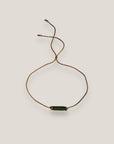 Pulsera minimal con tubo de esponja coral verde caqui y separadores gunmetal con brillis de cristal blanco