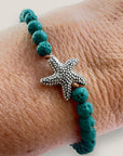 Pulsera con estrella plateada y lava verde oscuro