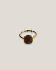 Goldring mit lila Amethyst-Stein, Stahlgold.