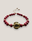 Pulsera con gran tortuga dorada y esponja coral rosa