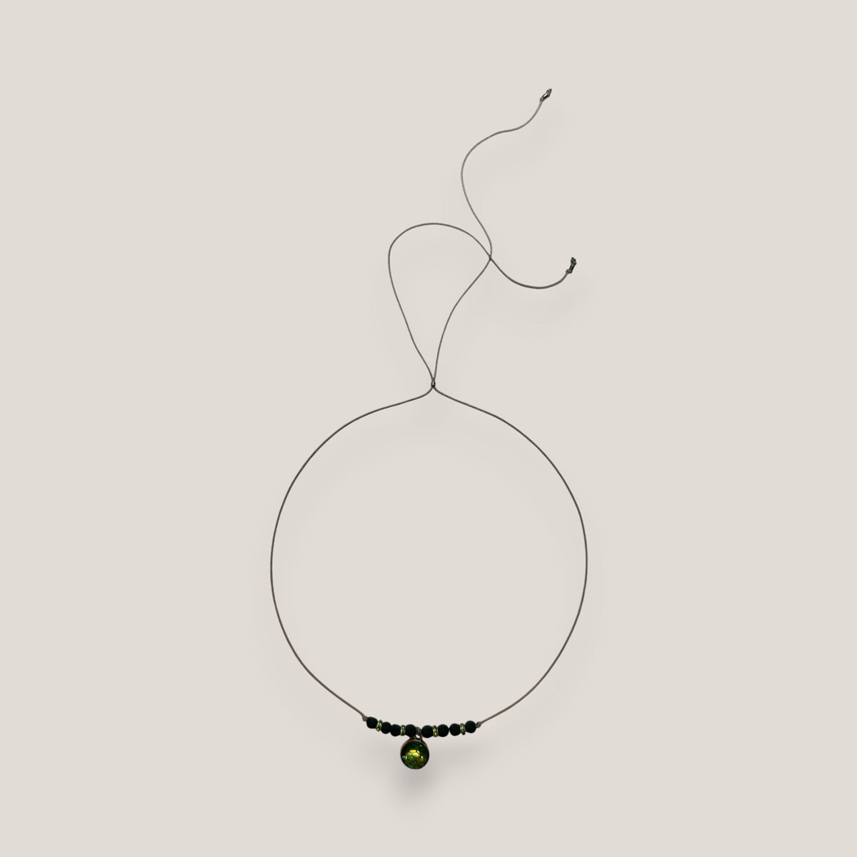 Midi necklace, circle, steel, iridescent green mermaid scales, dark green lava, light green crystal spacers