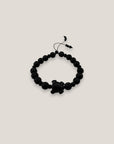 Pulsera tortuga resina negra lava negra cristales facetados negros