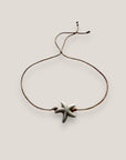 Pulsera minimal con estrella de Howlita natural blanca