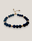 Pulsera Tirma piedra dorada y lava azul añil