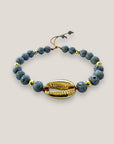 Pulsera gran cowrie dorado y lava gris metalizada