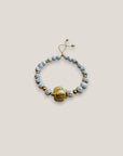 Pulsera con gran tortuga dorada lava blanca