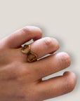 Infinity-Ring mit Herzen aus Stahl und Gold
