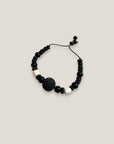 Pulsera ónix hueso gran cuenta esponja coral negra 20mm