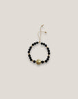 Pulsera con gran tortuga dorada lava negra