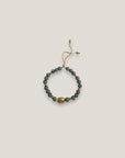 Pulsera con gran tortuga dorada lava gris claro