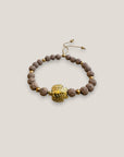 Armband mit großer goldener Schildkröte und Lavasand