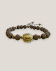 Armband mit großer goldener Schildkröte und Lavasand