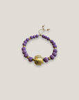 Armband mit großer goldener Schildkröte und malvenfarbener Lava