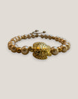 Armband mit großer goldener Schildkröte und rosa Perlen
