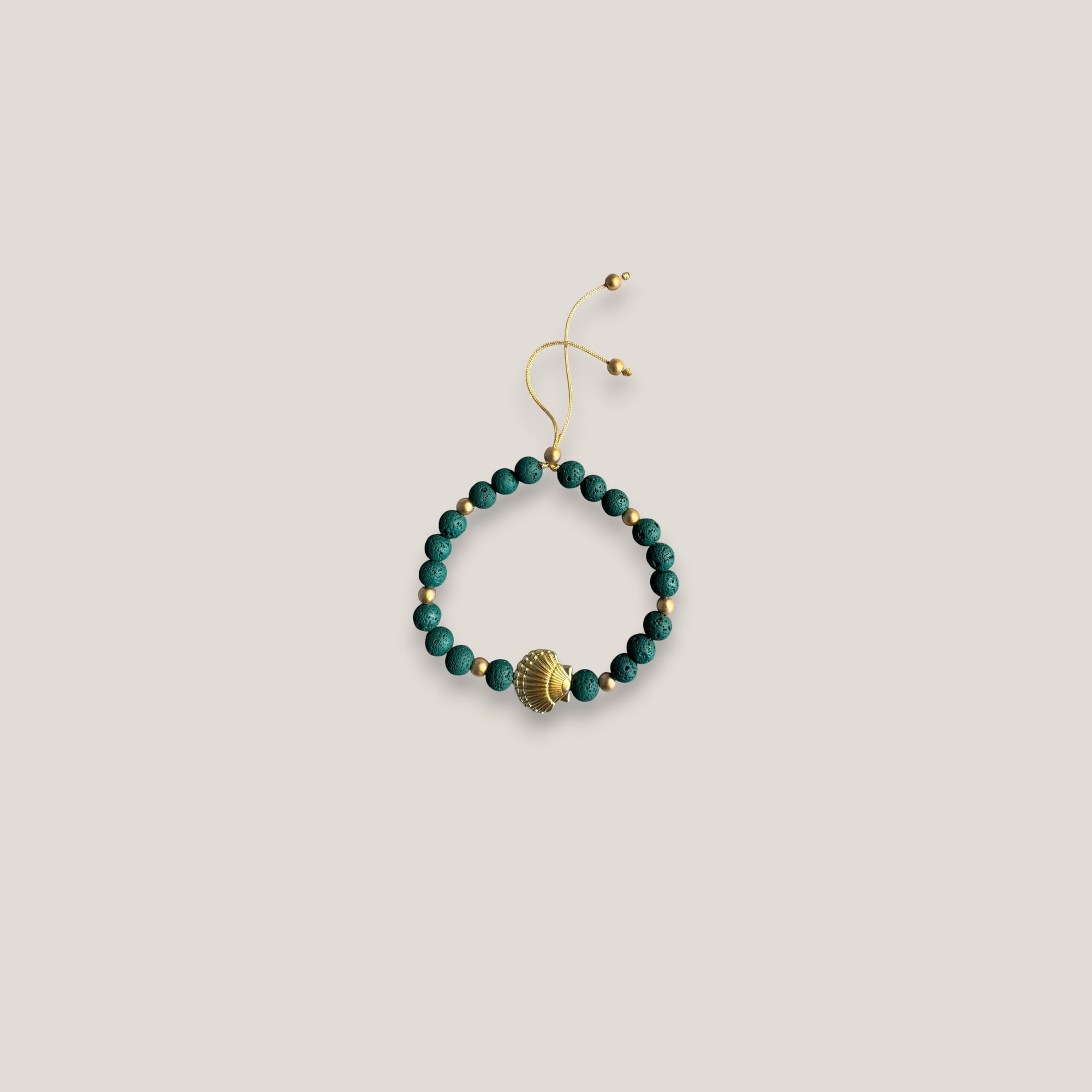 Pulsera gran concha dorada lava verde oscuro