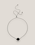 Collar minimal bola de lava negra 12mm separadores dorados cristalitos negros