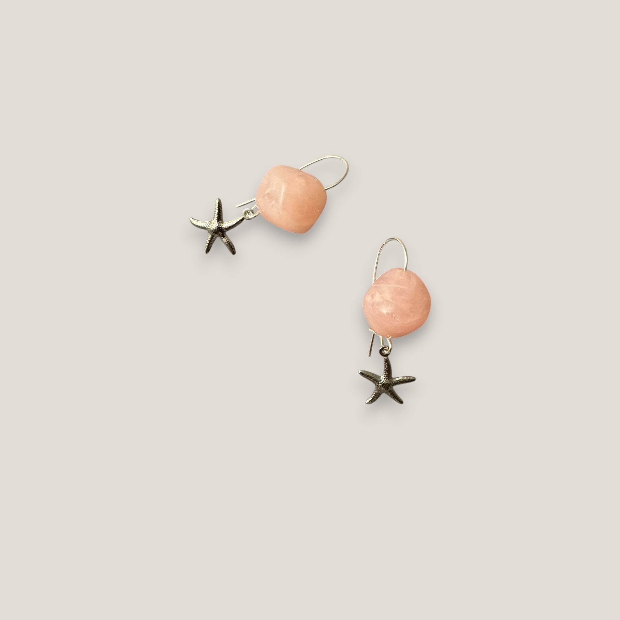 Pendientes gancho resina rosa claro estrella acero