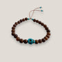 Pulsera con calavera de howlita turquesa y cuentas de madera de wengué
