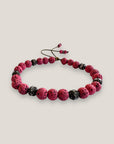 Pulsera Dafne con lava fucsia y filigranas bronce con cristalitos